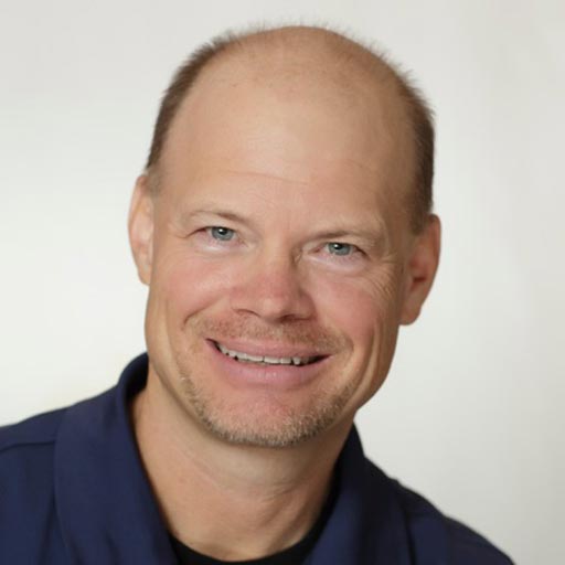 Aaron-TTC-Headshot Smiling man portrait